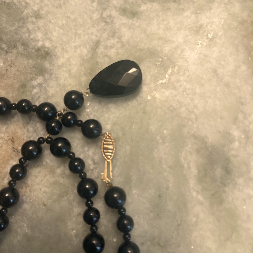 Yellow Gold Onyx Necklace with pendant from the Macy’s Effy collection